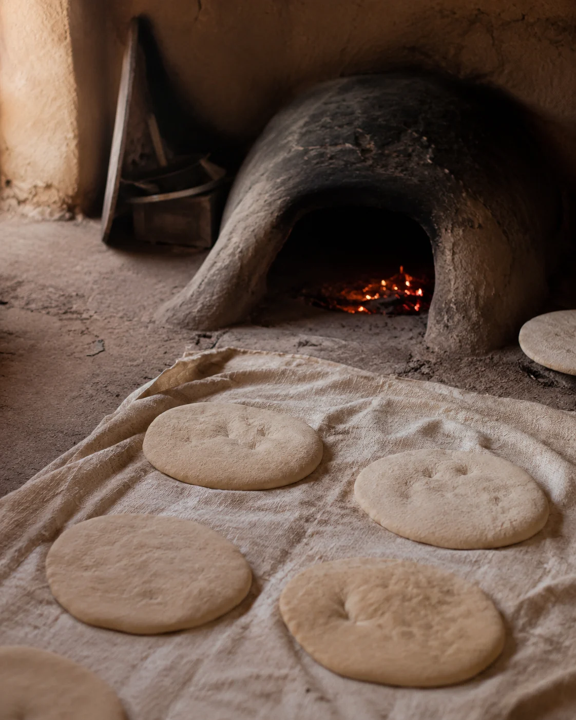 Bread dough resting on cloth before baking