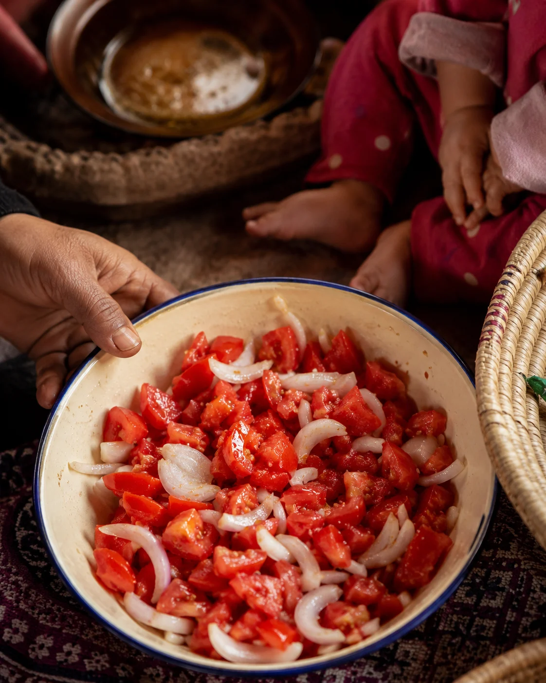 A simple tomato and onion salad with olive oil and vinegar