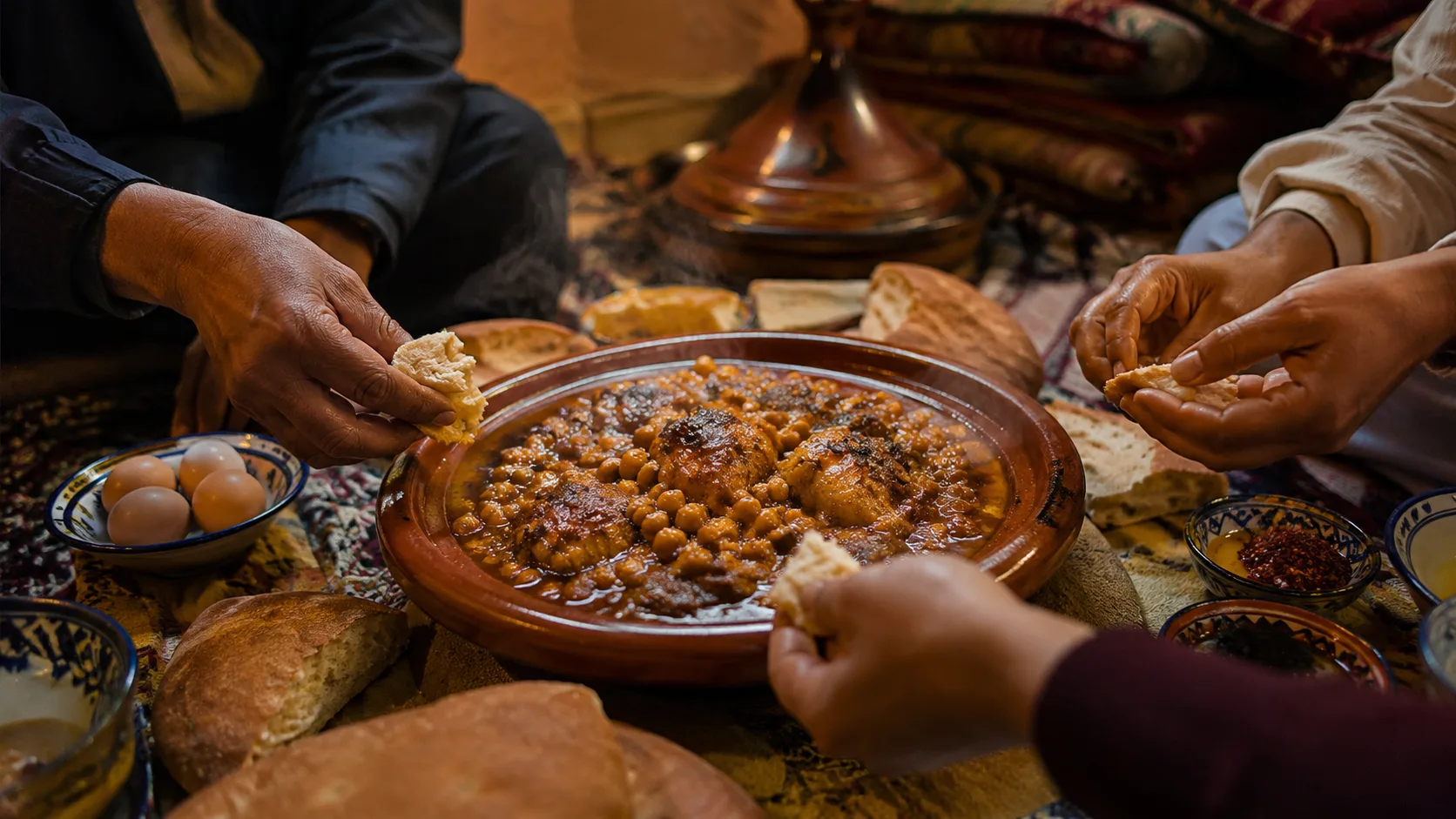 Family members sharing douez from one central dish